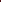 A woman models a long maroon and gold embroidered Silk Embellished Suit against a dark red studio backdrop, with a carved dark wooden chest behind her.