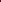 A woman stands in profile wearing a long maroon red Premium Silk Suit with an anarkali kurta featuring gold floral prints and embroidered cuffs, paired with matching patterned trousers and metallic gold heels, set against a dark red arched backdrop.